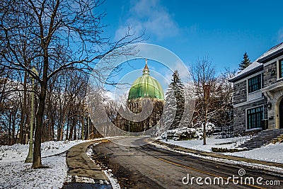 Street in Montreal with a view of Saint Josephs Oratory Dome - Montreal, Quebec, Canada Stock Photo