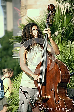 Street musician Editorial Stock Photo