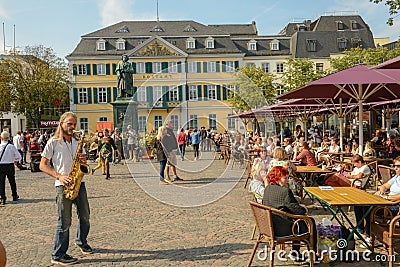 Street musician at MÃ¼nster square of Bonn on Germany Editorial Stock Photo