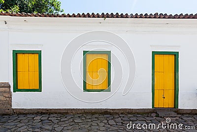 Street and old portuguese colonial houses in historic downtown i Stock Photo