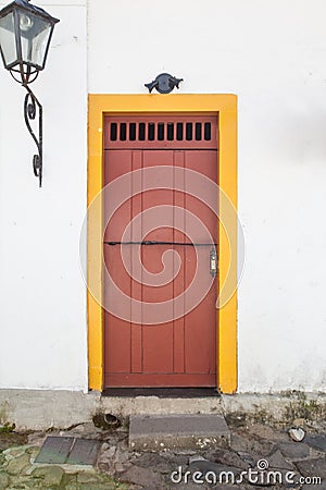 Street and old portuguese colonial houses in historic downtown i Stock Photo