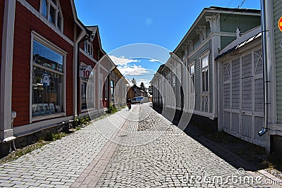 Street of Old Rauma with a cyclist and a van Editorial Stock Photo