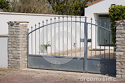 Street old vintage home grey ancient metal retro house gate Stock Photo