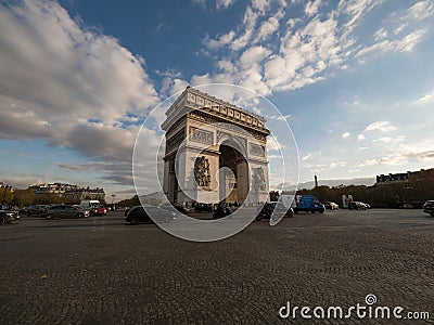 Street panorama view of historic Arc de Triomphe Etoile monument landmark traffic Champs Elysees Paris France Europe Editorial Stock Photo