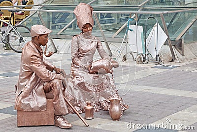 Street performers couple entertainers Editorial Stock Photo