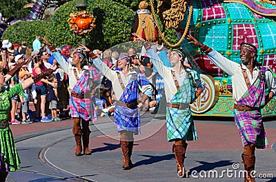 Street performers in a parade at Disneyworld Editorial Stock Photo