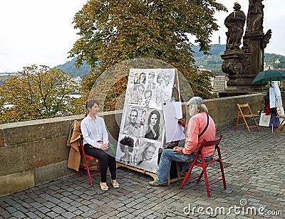 Street portrait artist painting Asian girl Editorial Stock Photo