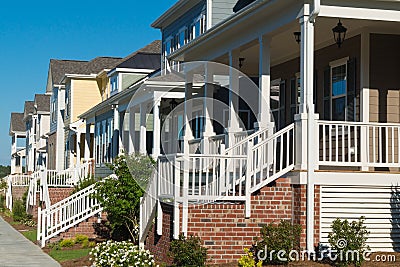 Street of residential houses with porches Stock Photo