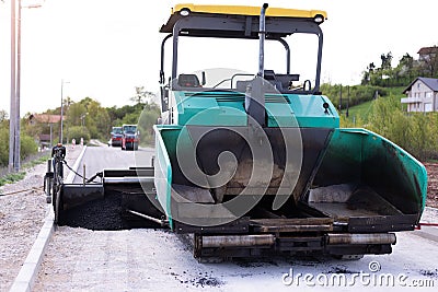 Street resurfacing. Fresh asphalt construction Stock Photo