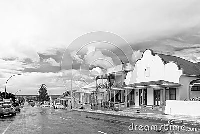 Street scene, with businesses in Bredasdorp. Monochrome Editorial Stock Photo