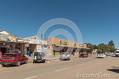 Street scene with businesses and vehicles in Ladybrand Editorial Stock Photo