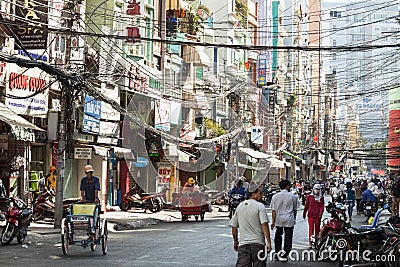 Street scene in the morning in Saigon, Vietnam Editorial Stock Photo