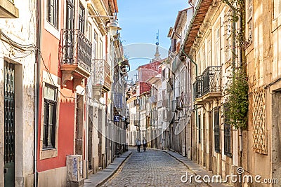 street scene in the old town of Braga with historic facades and people in early morning Editorial Stock Photo