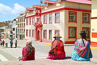 Street Scene of Plaza de Armas Square with the Gorgeous Justice Palace and Group of Local Ladies in Traditional Andean Clothing, Editorial Stock Photo