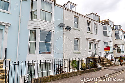 Street in a seaside town, with colorful facades of buildings, en Stock Photo