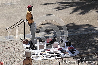 Street seller of luxury merchandising Editorial Stock Photo