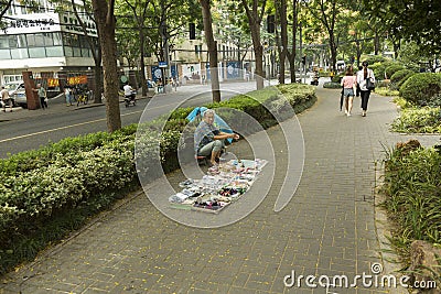 Street seller in Shanghai Editorial Stock Photo