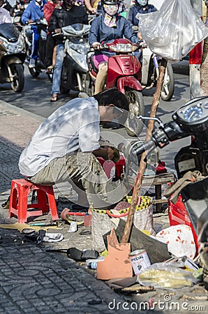 Street shoe maker Vietnam Editorial Stock Photo