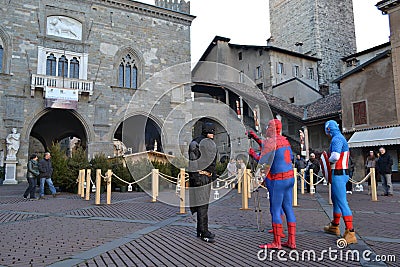 Street show of famous movie characters like spiderman, batman, superman, captain America. Editorial Stock Photo