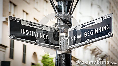 Street Sign to NEW BEGINNING versus INSOLVENCY Stock Photo