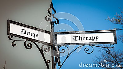 Street Sign to Therapy versus Drugs Stock Photo