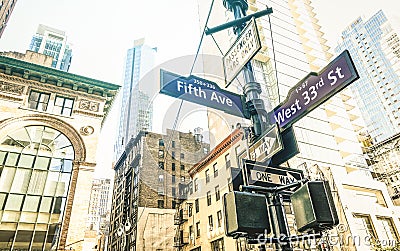 Street sign of Fifth Ave and West 33rd St in New York City - Manhattan Stock Photo