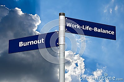 Street sign symbolizing choice between `burnout` and `work-life-balance` Stock Photo