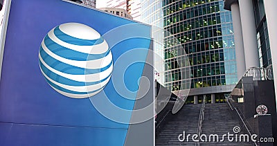 Street signage board with American Telephone and Telegraph Company ATT logo Editorial Stock Photo
