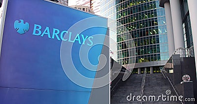 Street signage board with Barclays logo. Modern office center skyscraper and stairs background. Editorial 3D rendering Editorial Stock Photo