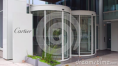 Street signage board with Cartier logo. Modern office building. Editorial 3D rendering Editorial Stock Photo