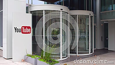 Street signage board with YouTube logo. Modern office building. Editorial 3D rendering Editorial Stock Photo