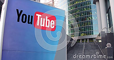 Street signage board with YouTube logo. Modern office center skyscraper and stairs background. Editorial 3D rendering Editorial Stock Photo