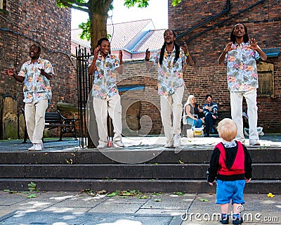 Street singers performing in historical city of York, England Editorial Stock Photo