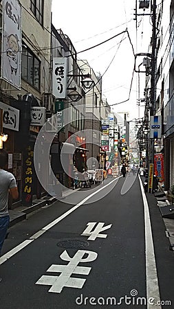 Street with small shops in suburban Tokyo Editorial Stock Photo