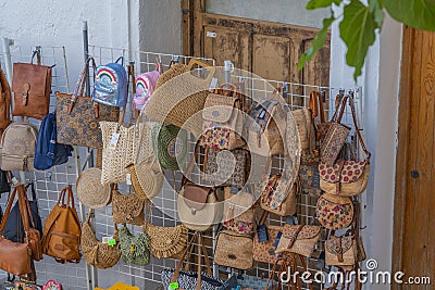 Street souvenirs market in Peniscola with traditional bags, Spain Editorial Stock Photo