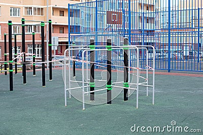 Street sports complex wrapped in striped red white tape. Sanitization of the local area, prevention of infection with the Stock Photo