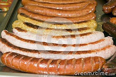 Street stand food knockwurst bratwurst fried kasekrainer sausage Stock Photo