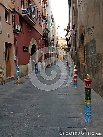 Street in Tarragona city with decorated pillars, Tarragona, Catalonia, Spain Editorial Stock Photo
