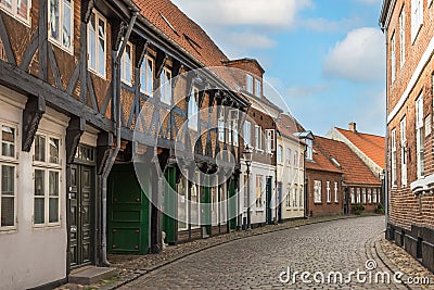 Street and traditional houses in old town of Ribe, Jutland, Denmark Stock Photo