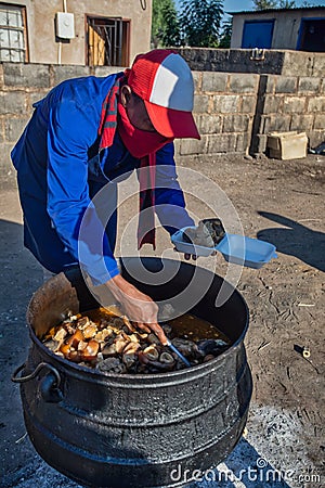 Street vendor cow heels cooking Stock Photo