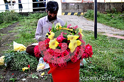A Street Vendor Sell Beautiful Flower The photo was taken from Hatirjheel Lake, Hatirjheel,Uttara on 06th October 2020 Editorial Stock Photo