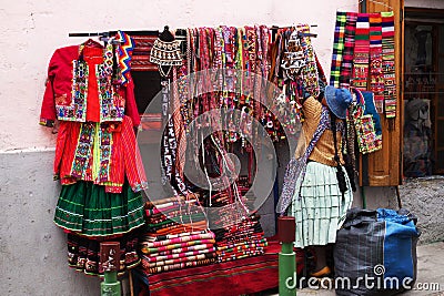 Street Vendor selling colorful clothing in La Paz, Bolivia Stock Photo