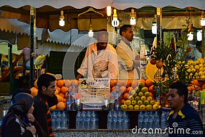 Street vendors in Djamaa El Fna square in Marrakesh, Morocco, Africa night scene Editorial Stock Photo