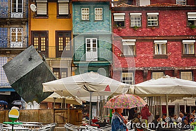 Street view on the beautiful old buildings with portuguese tiles on the Ribeira square in Porto city Editorial Stock Photo
