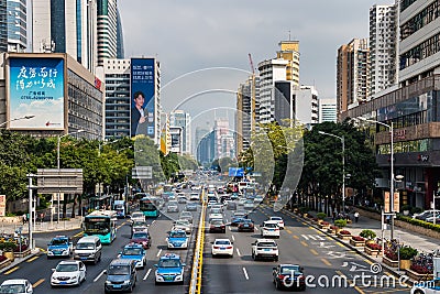 Street view of beautiful skylines in the Shennan Boulevard, one of busy streets in Shenzhen of China Editorial Stock Photo