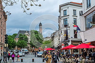 Street view of old downtown with lots of people walking at the street of Brussels, Belgium Editorial Stock Photo