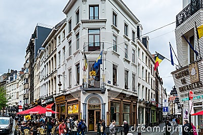 Street view of old downtown with lots of people walking at the street of Brussels, Belgium Editorial Stock Photo