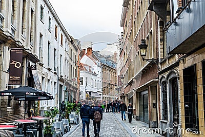 Street view of old downtown with lots of people walking at the street of Brussels, Belgium Editorial Stock Photo