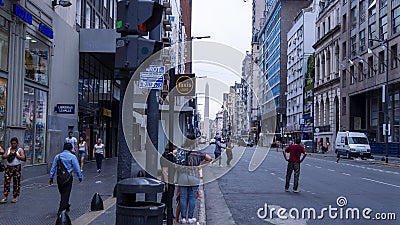 Corrientes avenue, Buenos Aires, on a clouded afternoon Editorial Stock Photo