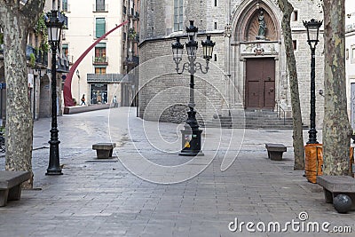 Street view,promenade,Passeig del Born, at background San Maria Editorial Stock Photo